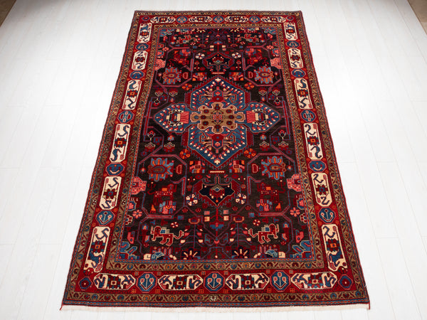 9' 8" x 5' 6" Excellent Hand-Knotted Vintage Tribal Rug